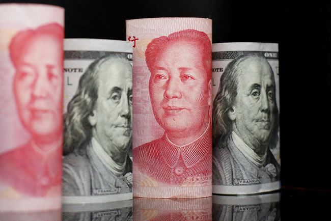 中国离岸人民币兑美元单日大涨超300点 一度破7.12关口