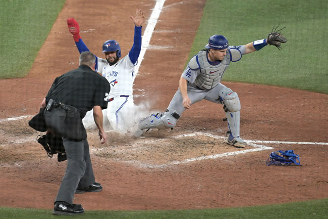 MLB/摄影记者1张照片还原蓝鸟G7与冠军「10亿(一元一分麻将群)分之1秒的差距」